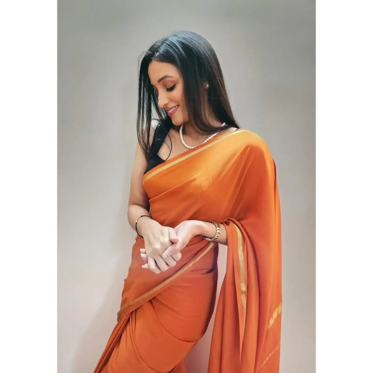 SRINIDHI SHETTY IMAGES IN SLEEVELESS ORANGE SAREE 3